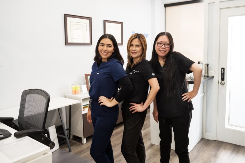 Photo Dr. Marie, Ruby, and Fanny posing with their left hands on their hips